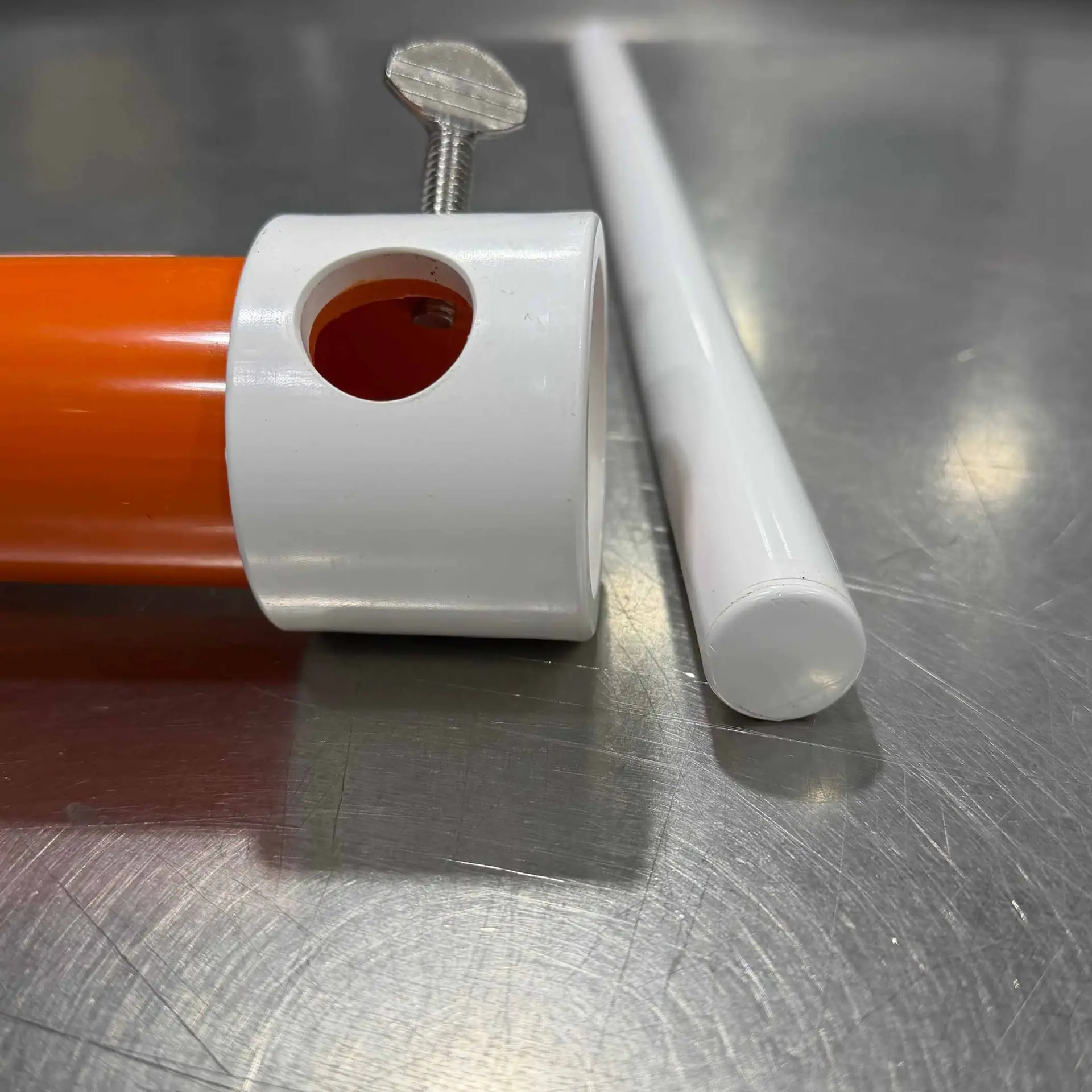 AugBrella Handle - Photo of orange augbrella with handle for reference purposes