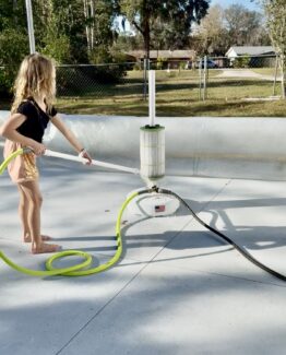 Photo of girl cleaning a pool filter
