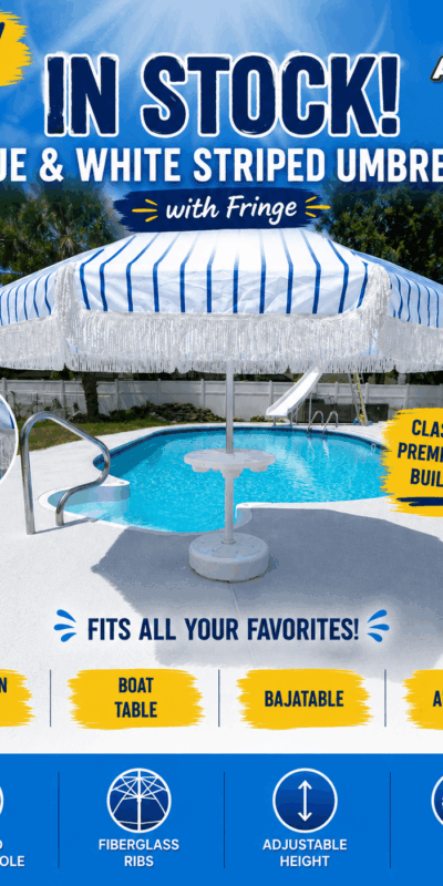 Striped umbrella with fringe pool beach boat backyard