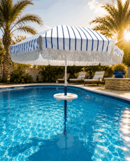 Photo of swimming pool table with umbrella