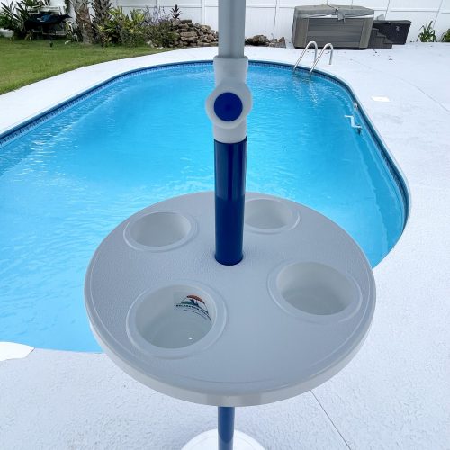 Adjustable height umbrella for pool