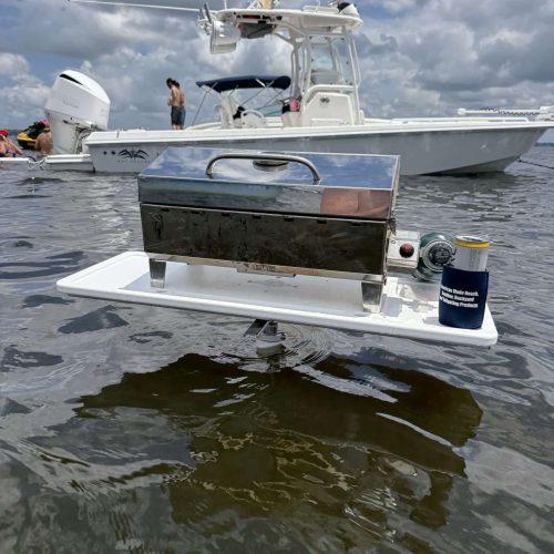 photo of a grill being used i nthe water on a tabletop